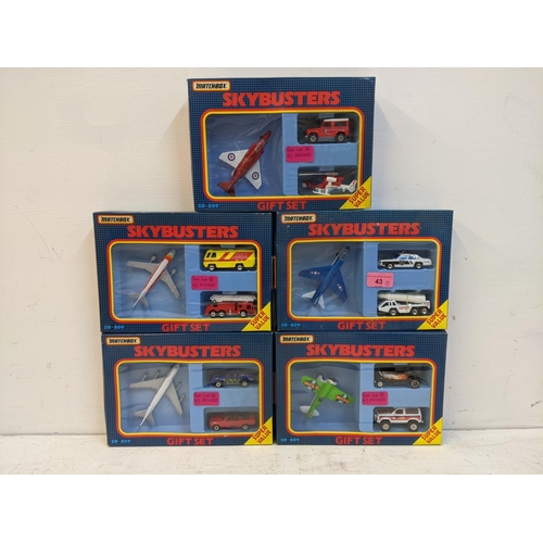 43 - Five Matchbox Skybusters gift sets to include an RAF fighter jet with a Land Rover and a Sheriffs he... 