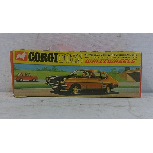 74 - A Corgi Whizzwheels 3 litre V6 Ford Capri 311 in florescent orange, fitted with black interior and r... 