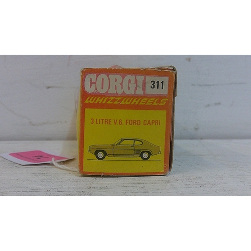 74 - A Corgi Whizzwheels 3 litre V6 Ford Capri 311 in florescent orange, fitted with black interior and r... 