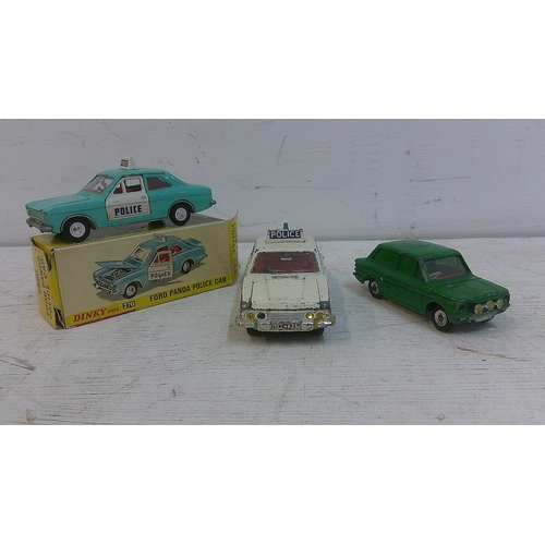 75 - Three Dinky toys to include a Ford Escort Panda police car with original box (270), a Ford Zodiac Pa... 