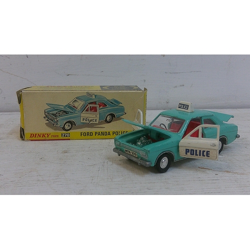 75 - Three Dinky toys to include a Ford Escort Panda police car with original box (270), a Ford Zodiac Pa... 