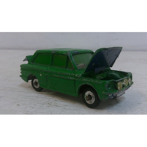 75 - Three Dinky toys to include a Ford Escort Panda police car with original box (270), a Ford Zodiac Pa... 