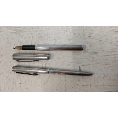 25 - Dunhill fountain and ballpoint silver pen set with striped bodies
Location: LAB
