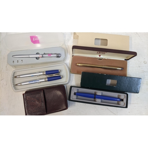 28 - A Cross gold tone ballpoint pen in original box together with other pens and a vintage Bloomingdale'... 