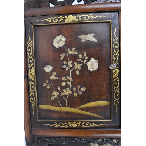 147 - A Japanese Meiji period shibayama inlaid shodona hanging cabinet, circa 1900, with various shelves a... 