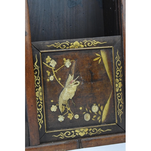 147 - A Japanese Meiji period shibayama inlaid shodona hanging cabinet, circa 1900, with various shelves a... 