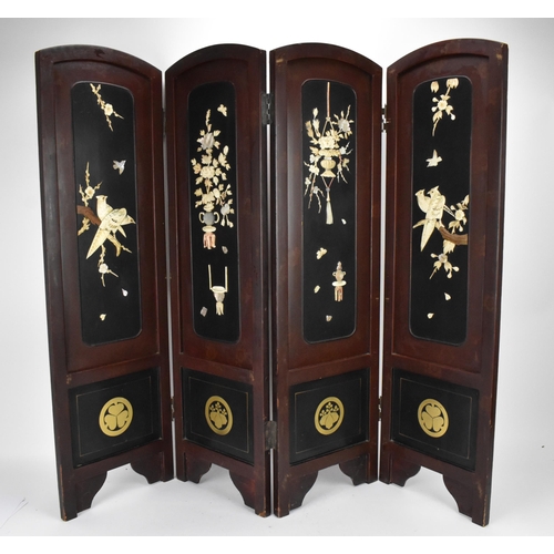 148 - A Japanese lacquer, bone and mother-of-pearl inlaid four-fold screen, circa 1900, each arched panel ... 