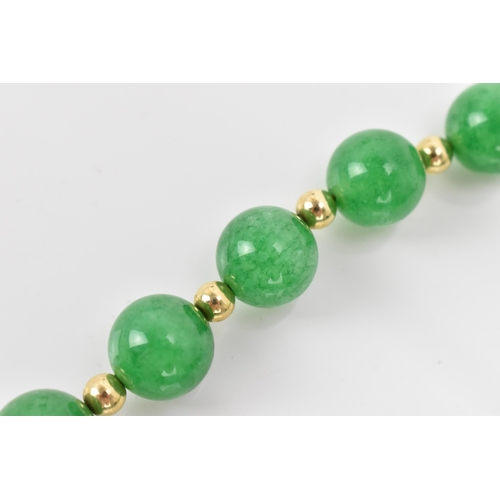 184A - A green jade same-sized bead and 9ct gold necklace, with 26 approx. 12mm diameter round jade beads, ... 