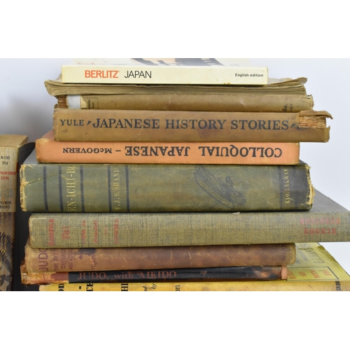 210 - A large collection of Japanese related books, to include The Mikado's Empire by Griffis, Fairy tales... 