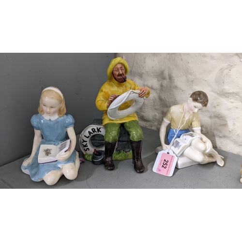 252 - A Royal Doulton figure 'The Boatman' H.N number 2417 together with Royal Doulton 'Treasure Island' H... 