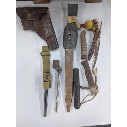 272 - Mixed militaria and related to include a WWII era spike bayonet with scabbard, a shagreen handle, a ... 