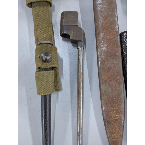 272 - Mixed militaria and related to include a WWII era spike bayonet with scabbard, a shagreen handle, a ... 