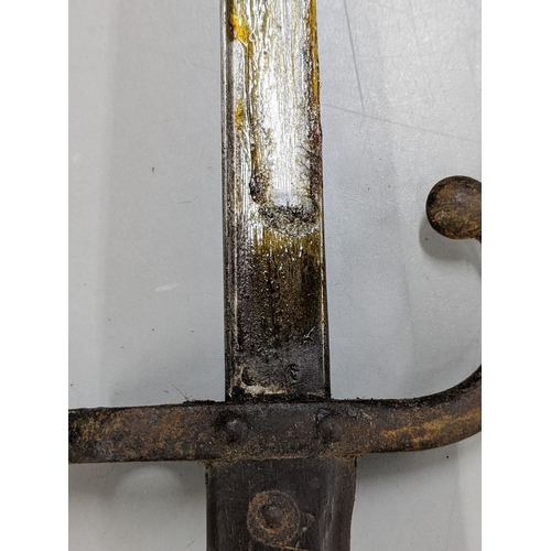 275 - A 19th century French 'Gras' bayonet having 52cm triangular blade, signed to back and dated 1875, to... 