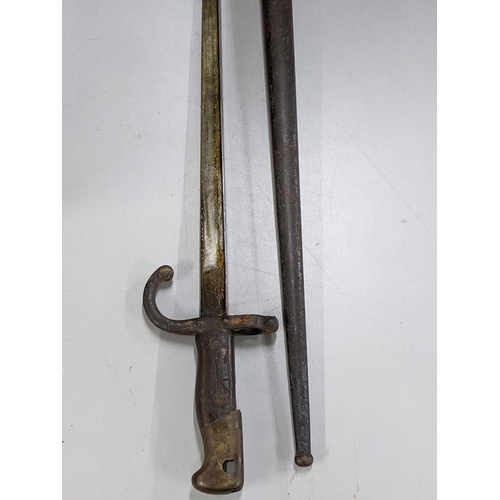 275 - A 19th century French 'Gras' bayonet having 52cm triangular blade, signed to back and dated 1875, to... 