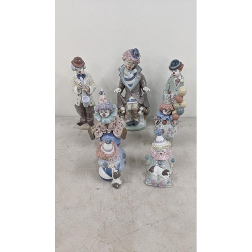 334 - A group of seven Lladro figurines to include '5901 surprise' 5811 Littlest clown and others
Location... 