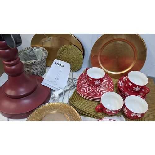 278 - Christmas related items to include Hausenware, cups, saucers, plates, place mats, a lamp fashioned a... 