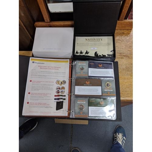 464 - The Westminster Roman Britain Coin Collection in one album, and a box of The Nativity Commemorative ... 