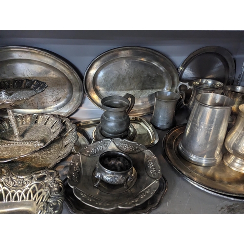 346 - Mixed metalware to include silver plated trays, platter, tankards along with pewter examples
Locatio... 