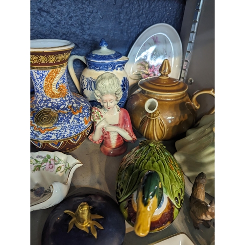 348 - A mixed lot to include a Michael Caugant ceramic duck A/F, Royal Doulton Clarissa figure, mixed cera... 