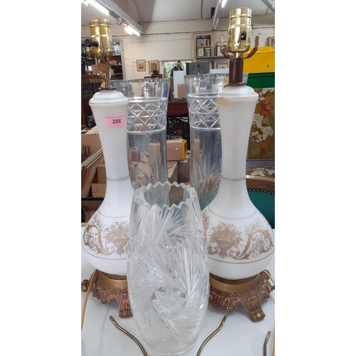 386 - Two large cut glass vases and another together with a pair of milk glass vase shaped table lamps wit... 