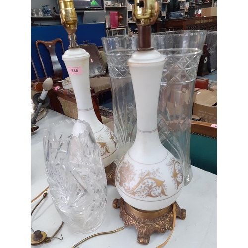 386 - Two large cut glass vases and another together with a pair of milk glass vase shaped table lamps wit... 