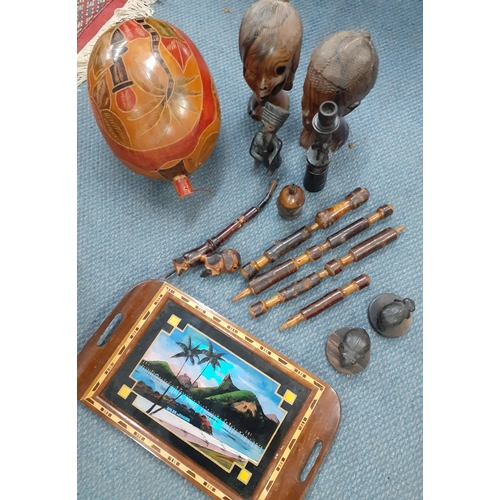 388 - A quantity of African treen to include two carved busts together with a butterfly wing tray and Asia... 