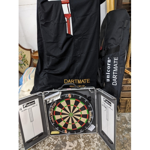 392 - A Unicorn Dartmate folding metal stand in slip case and dart board in case Location: G