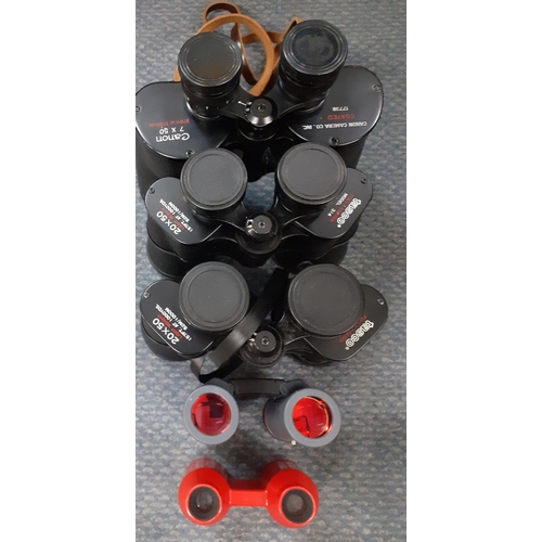 406 - Tasco binoculars, Canon binoculars and a Revere 8mm projector
Location: A1F