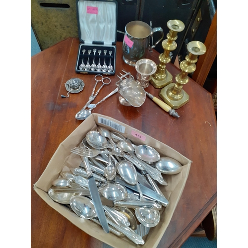 413 - A quantity of silver plate to include cutlery, a tankard and teaspoons together with a pair of brass... 