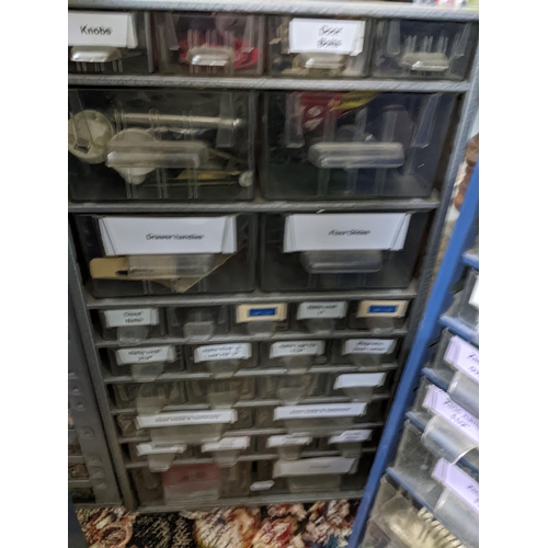 420 - A group of six tool chests containing various hardware accessories, including right angle braces, ch... 