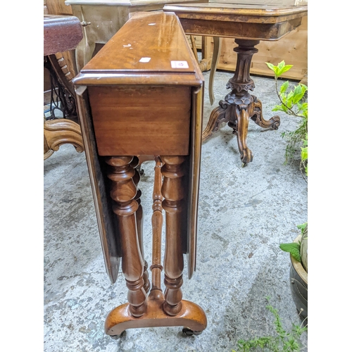 434 - Victorian mahogany Sutherland table on turned columns and legs, brass castors 72cm x 90.5cm x 6.5cm ... 