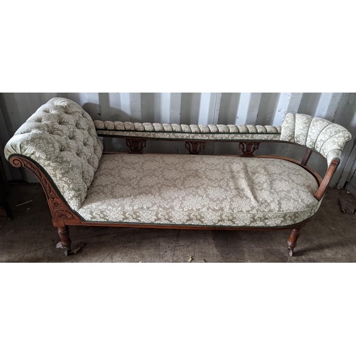 447 - A late Victorian walnut carved reupholstered chaise longue, 76cm h x 184cm w
Location: CONR