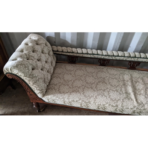 447 - A late Victorian walnut carved reupholstered chaise longue, 76cm h x 184cm w
Location: CONR