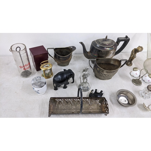 452 - A mixed lot to include a silver spoon, silver plated tea set, miniature clock and other items Locati... 