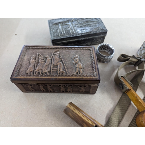 493 - A mixed lot to include carved treen boxes, and a metal example, cloisonne dish and ashtray in the fo... 