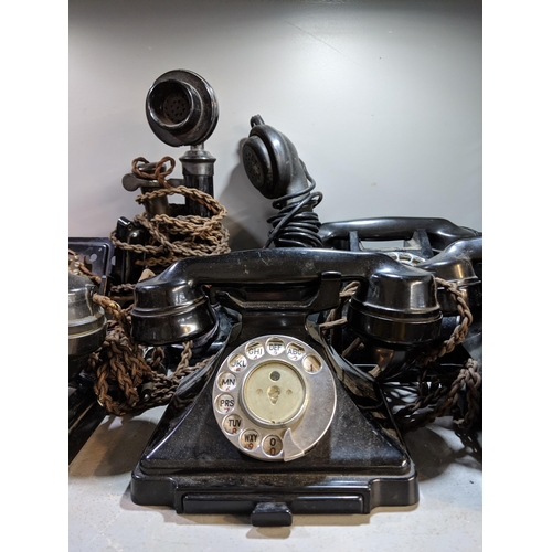 499 - A collection of vintage telephones including five vintage Bakelite telephones, one wall hanging phon... 