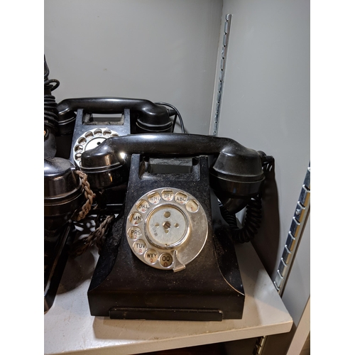 499 - A collection of vintage telephones including five vintage Bakelite telephones, one wall hanging phon... 