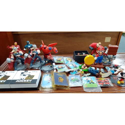 509 - Action models and collectable figures to include Disney Infinity, Super Mario, and Popeye together w... 