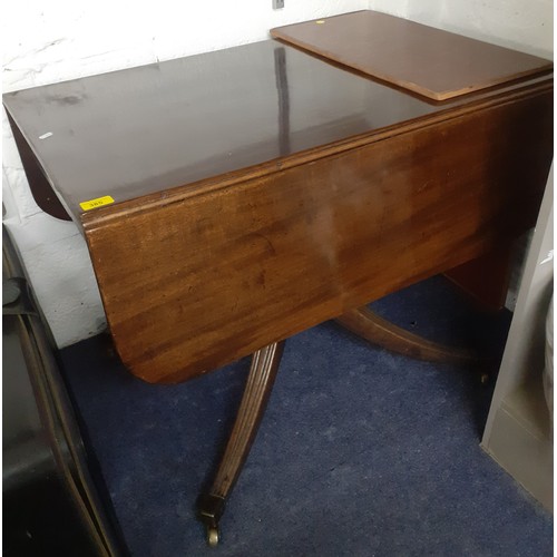 468A - An early 20th century mahogany drop leaf table having a single drawer and a pedestal base Location: ... 