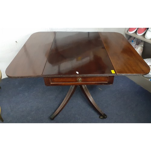 468A - An early 20th century mahogany drop leaf table having a single drawer and a pedestal base Location: ... 