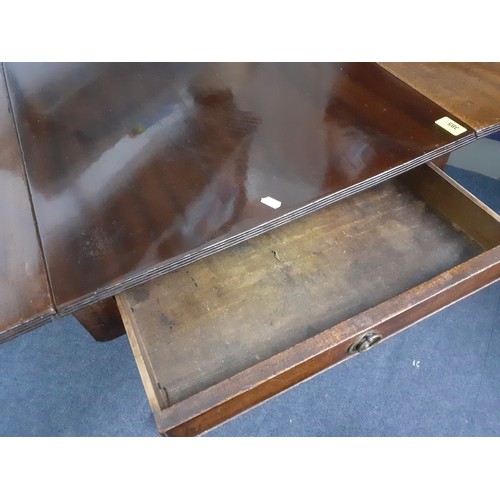 468A - An early 20th century mahogany drop leaf table having a single drawer and a pedestal base Location: ... 