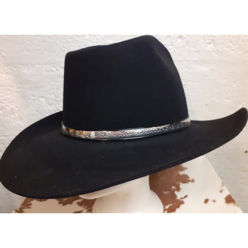 119 - A Resistol Western black beaver 'Long Oval' Stetson, size 7 and 1/8 in branded hat box.
Location: A3... 