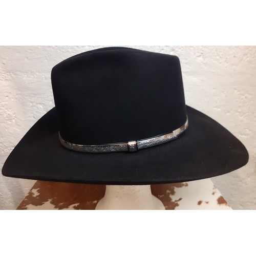 119 - A Resistol Western black beaver 'Long Oval' Stetson, size 7 and 1/8 in branded hat box.
Location: A3... 