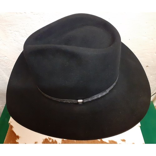 119 - A Resistol Western black beaver 'Long Oval' Stetson, size 7 and 1/8 in branded hat box.
Location: A3... 