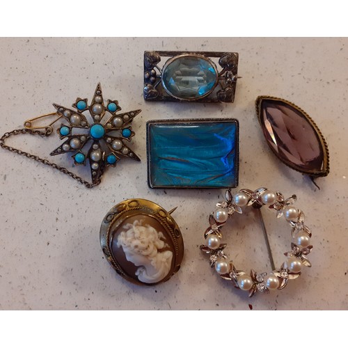 75 - A quantity of costume jewellery to include a Sterling silver morpho brooch, early 20th Century paste... 