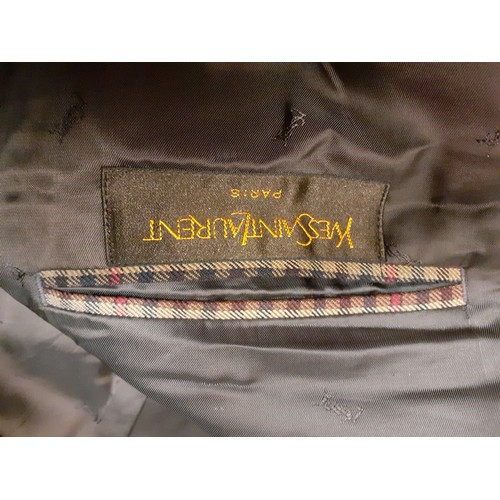 81 - Yves Saint Laurent- A gents vintage brown jacket in a tweed style checked pattern having 2 branded l... 