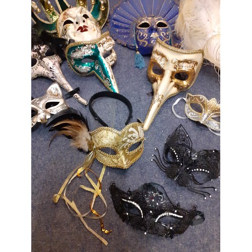 86 - A quantity of Venetian ornate masquerade masks, several stamped Venezia to the reverse. Location:BWR