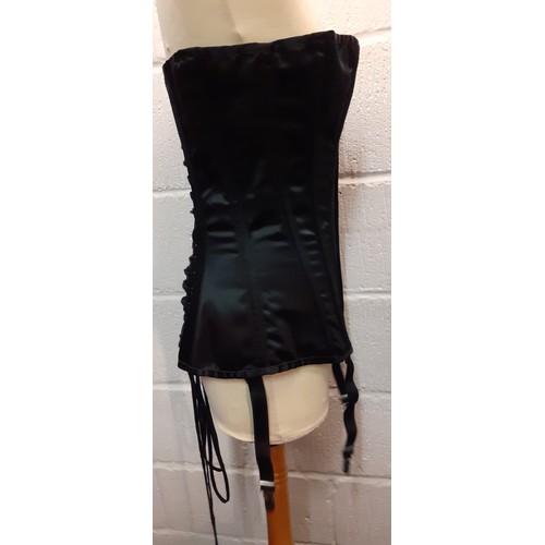 84 - A Vollers bespoke black satin corset with original box, adjustable sizing from 32