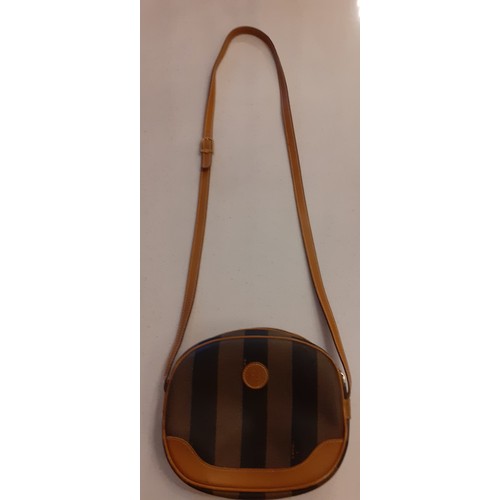 88 - A small group of vintage bags to include a 1980's Fendi shoulder bag with striped design canvas and ... 