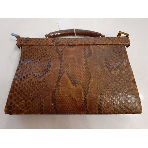 113 - A mixed lot comprising a vintage brown snakeskin handbag with mirror and purse, 2 vintage compacts, ... 